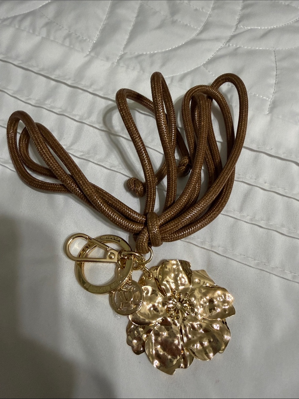 Michael Kors Gold Floral Pendant Necklace with Brown Cord